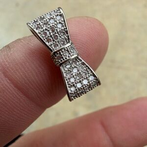 Elegant Silver Bow Tie Pendant